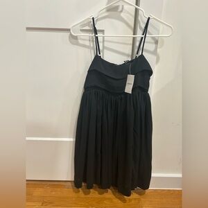Black spaghetti strap dress.
